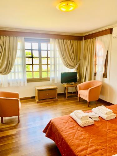 Postel nebo postele na pokoji v ubytování Dionysus Residence Pikermi
