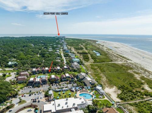 an aerial view of the beach at ocean front apartment complexes at 327 Capt John Fripp Villa in Fripp Island