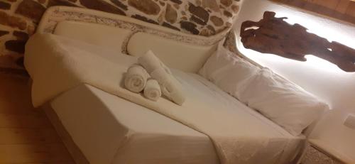Katil atau katil-katil dalam bilik di Relax Holistic House