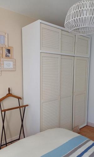 Llit o llits en una habitació de Chambre cosy