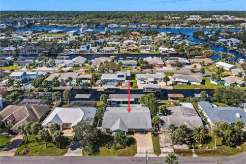 an aerial view of a town with houses at Canal Front Beach Home, Private Pool in Flagler Beach