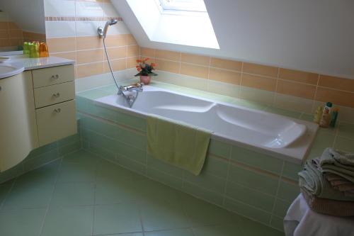 Ванная комната в Le Clos Des Roses