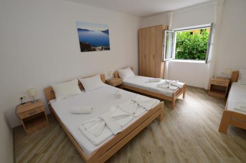 Ένα ή περισσότερα κρεβάτια σε δωμάτιο στο Apartments Begovic