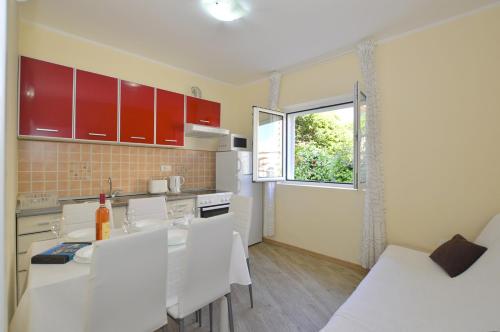 Η κουζίνα ή μικρή κουζίνα στο Apartments Begovic