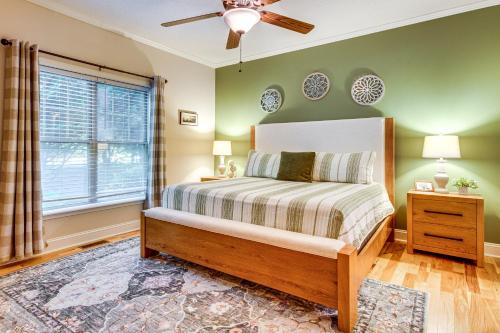 a bedroom with a bed and a window at Sandy Beach, Fun Games and Barn Lake Lure Gem! in Lake Lure