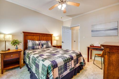 a bedroom with a bed and a ceiling fan at Sandy Beach, Fun Games and Barn Lake Lure Gem! in Lake Lure