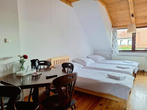 En eller flere senge i et værelse på Nowa Villa Zosieńka darmowy free PARKING