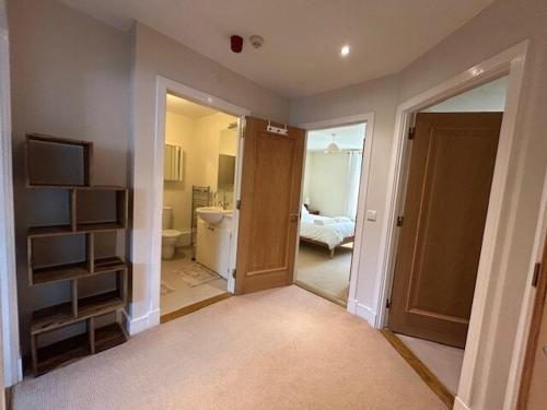 a room with a hallway with a bathroom and a bedroom at My Kilkenny Stay - walk to city centre in 5 mins in Kilkenny