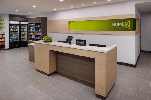 a home store checkout counter in a store at Home2 Suites By Hilton Clearwater St. Petersburg Ulmerton Rd in Clearwater