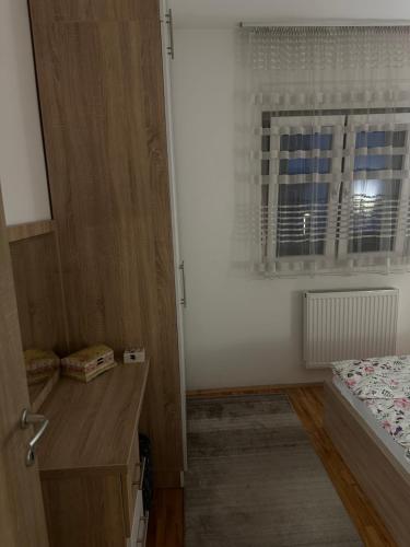 Postel nebo postele na pokoji v ubytování Apartman LadyA