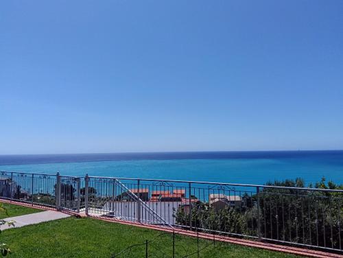 a view of the ocean from a balcony at Stella di mare - appartamenti vista incantevole su Moneglia in Moneglia