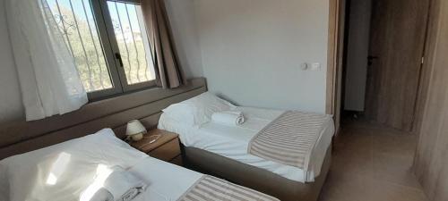 Ένα ή περισσότερα κρεβάτια σε δωμάτιο στο Casa di Laino