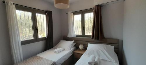 Ένα ή περισσότερα κρεβάτια σε δωμάτιο στο Casa di Laino