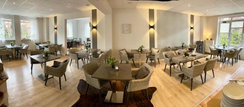 En restaurant eller et andet spisested på Hotel Garni am Obsthof Stade - Altes Land