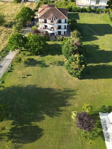an aerial view of a large yard with a house at Antonios Apartments in Ulcinj