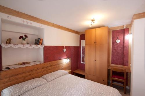 Postel nebo postele na pokoji v ubytování Residence Arvinei