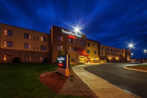 a hotel building with a sign in front of it at TownePlace Suites by Marriott Hattiesburg in Hattiesburg