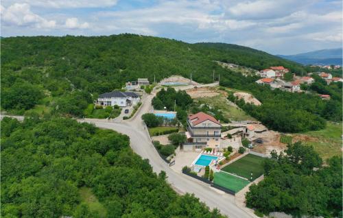 an aerial view of a house on a hill at Lovely Home In Podbablje Gornje in Podbablje