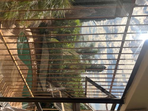 a view of the blinds on a window at Bugera's Palace in Pretoria