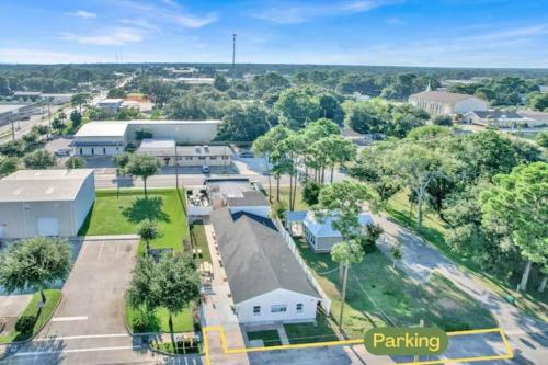 an aerial view of the parking lot of a building at Coral Reef Coast Close 2 BCH - Unit 1 in Fort Walton Beach