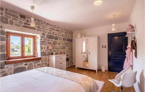 Ένα ή περισσότερα κρεβάτια σε δωμάτιο στο Stunning Home In Solin With Wifi