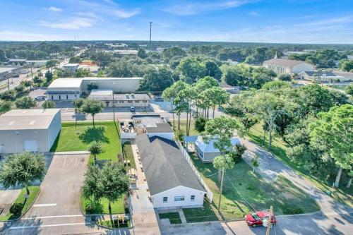 an aerial view of a building with a parking lot at The Starfish Home Near the Beach - Unit 2 in Fort Walton Beach