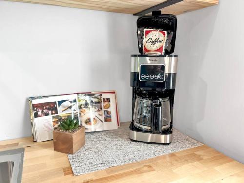 a coffee maker sitting on a counter in a room at Sunset Dream Minutes from the Beach - Unit 8 in Fort Walton Beach