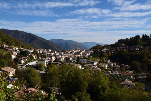 a view of a town in the mountains at Casa Pracol in Combai