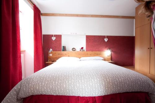 Ein Bett oder Betten in einem Zimmer der Unterkunft Residence Arvinei