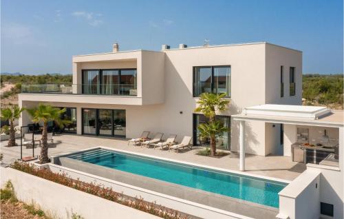 an image of a villa with a swimming pool at Awesome Home In Vodice in Vodice