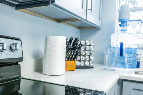 a kitchen counter with a roll of paper towels at Roosevelt Inn in Jacksonville