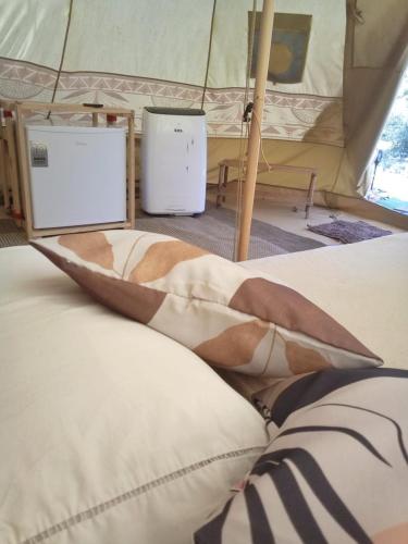 Katil atau katil-katil dalam bilik di Odara Glamping-Jalapão