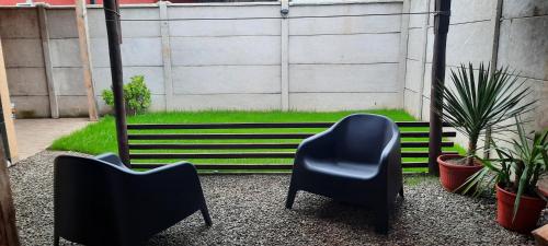 Ruang duduk di Habitación privada y baño compartido