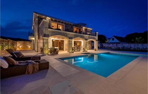 a house with a swimming pool in front of it at Gorgeous Home In Cera With Wifi 