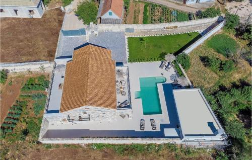 an overhead view of a building with a roof at Gorgeous Home In Cera With Wifi 