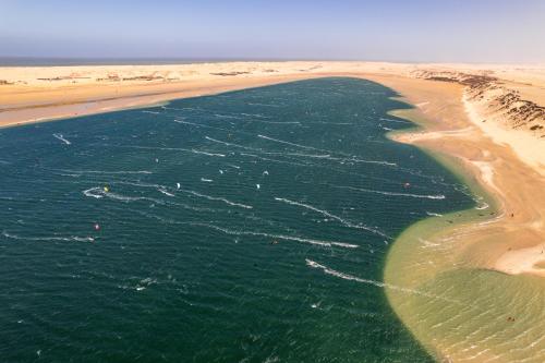 an aerial view of the ocean and a beach at Desert Sands Dakhla Lagoon View & Kitesurf Spot in Dakhla
