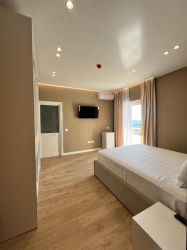 Ένα ή περισσότερα κρεβάτια σε δωμάτιο στο Sun Lake Villa