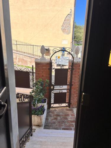 an entrance to a building with an open door at Residenza Colonna in Lanuvio