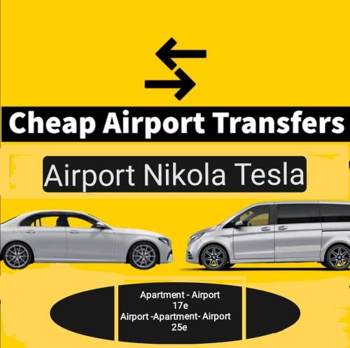 two cars are parked next to each other at Airport Apartment AIR in Surčin