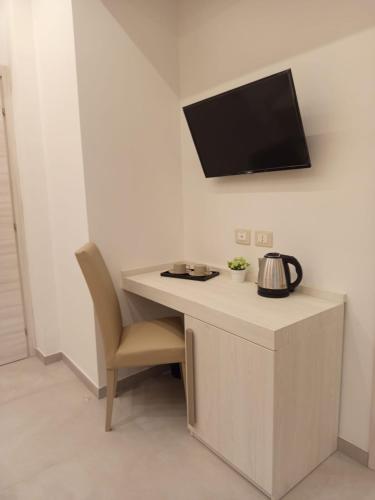 Μια τηλεόραση ή/και κέντρο ψυχαγωγίας στο L'elite Bed and Breakfast