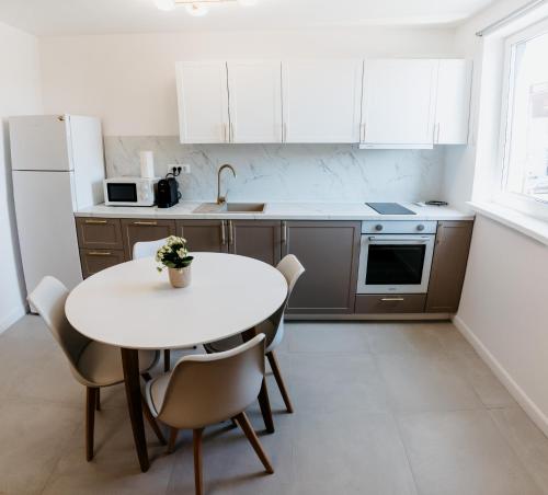 Dapur atau dapur kecil di Evo Residence Oasului
