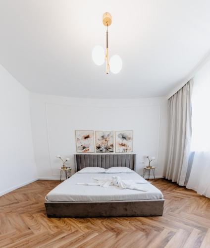 Katil atau katil-katil dalam bilik di Evo Residence Oasului