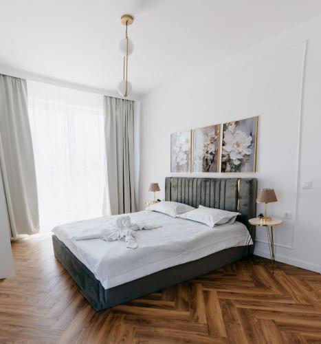 Katil atau katil-katil dalam bilik di Evo Residence Oasului