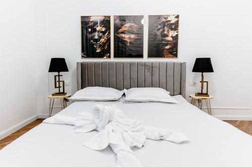 Katil atau katil-katil dalam bilik di Evo Residence Oasului