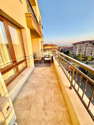 a balcony of a building with a view of the water at Sorrento E 4 4 Sveti Vlas in Sveti Vlas