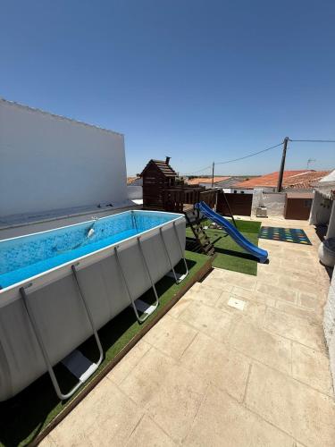 a swimming pool on top of a house at Santinho house 2 in Beja