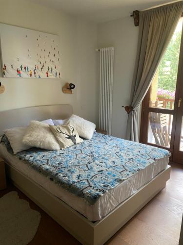 En eller flere senge i et værelse på Maison Poluc - Carpe Diem