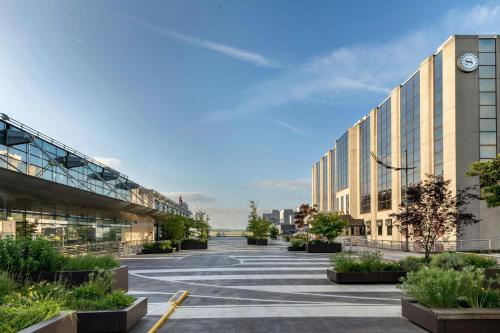 an empty parking lot in front of a building at Sheraton Brussels Airport Hotel in Zaventem