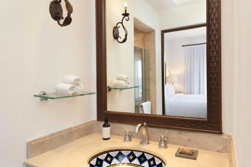 a bathroom with a sink and a mirror at Hacienda del Mar Los Cabos, an Autograph Collection All-Inclusive Resort in Cabo San Lucas