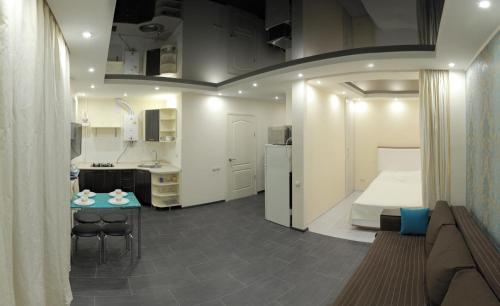 Η κουζίνα ή μικρή κουζίνα στο Studio at Tsentralnyi Prospekt